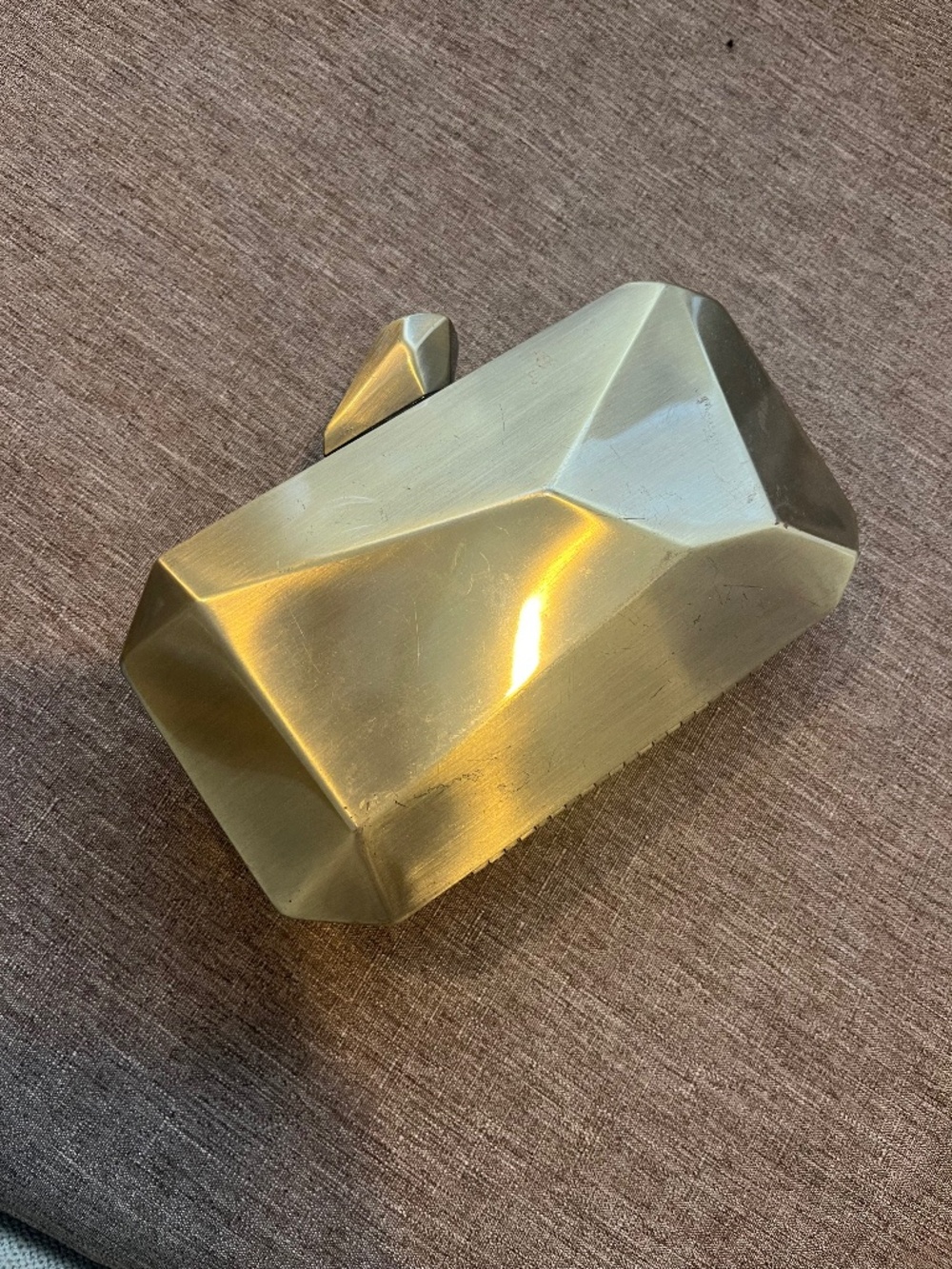 Gold metal clutch